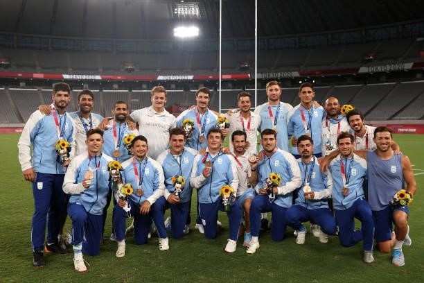Team Argentina pose for photographs with their bronze medals on day five of the Tokyo 2020 Olympic Games at Tokyo Stadium on July 28, 2021 in Chofu,...