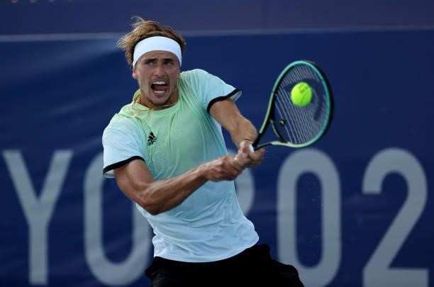 Alexander Zverev of Team Germany plays a backhand during his Men's Singles Third Round match against Nikoloz Basilashvili of Team Georgia on day five...