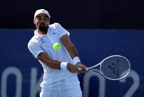 Jeremy Chardy of Team France plays a backhand during his Men's Singles Third Round match against Liam Broady of Team Great Britain on day five of the...