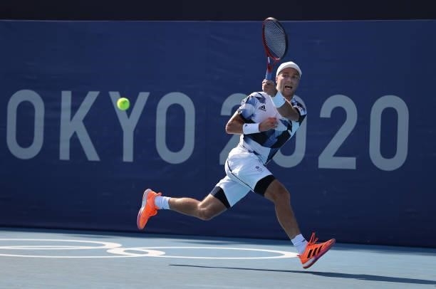Liam Broady of Team Great Britain plays a forehand during his Men's Singles Third Round match against Jeremy Chardy of Team France on day five of the...