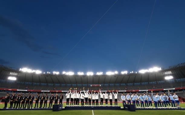 Team New Zealand, Team Fiji and Team Argentina during the medals ceremoy day five of the Tokyo 2020 Olympic Games at Tokyo Stadium on July 28, 2021...