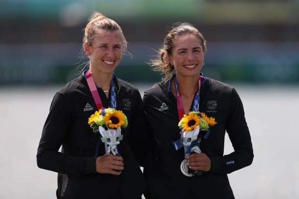 Silver medalists Brooke Donoghue and Hannah Osborne of Team New Zealand pose with their medals during the medal ceremony for the Women's Double...
