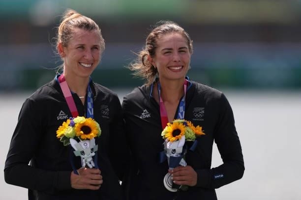 Silver medalists Brooke Donoghue and Hannah Osborne of Team New Zealand pose with their medals during the medal ceremony for the Women's Double...