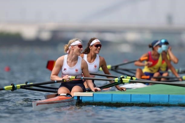 Lisa Scheenaard and Roos de Jong of Team Netherlands look back during the Women's Double Sculls Final A on day five of the Tokyo 2020 Olympic Games...