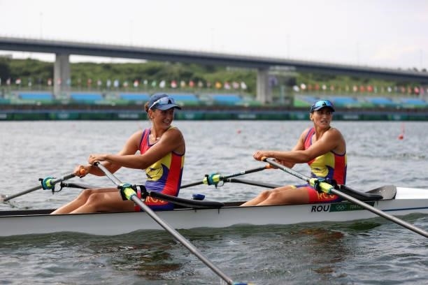 Gold medalists Ancuta Bodnar and Simona Radis of Team Romania celebrate after winning the Women's Double Sculls Final A on day five of the Tokyo 2020...