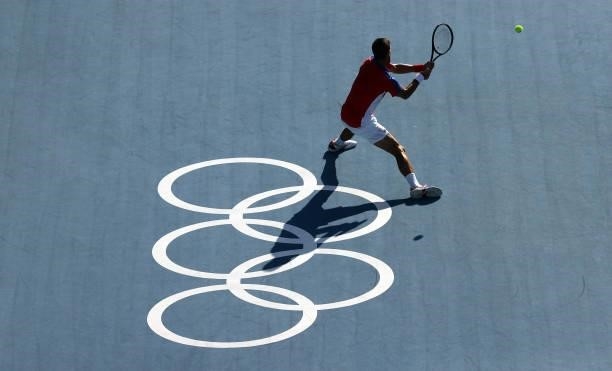 Novak Djokovic of Team Serbia plays a backhand during his Men's Singles Third Round match against Alejandro Davidovich Fokina of Team Spain on day...