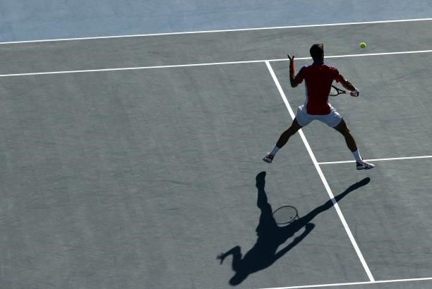Novak Djokovic of Team Serbia plays a backhand during his Men's Singles Third Round match against Alejandro Davidovich Fokina of Team Spain on day...