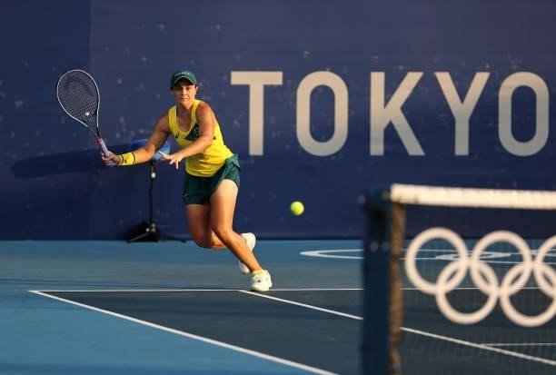 Ashleigh Barty of Team Australia plays a forehand in her Mixed Doubles First Round match with John Peers of Team Australia against Horacio Zeballos...