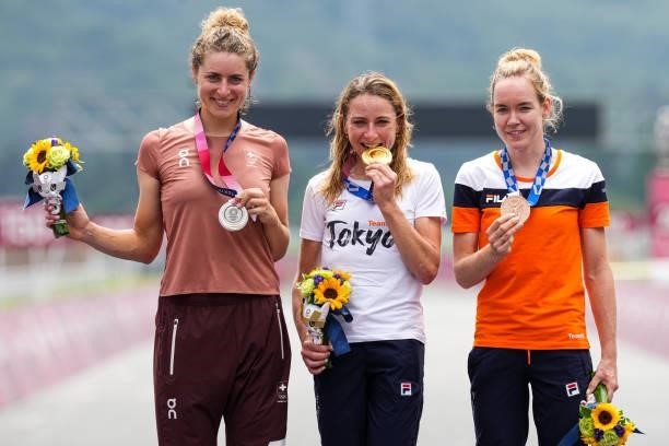 Silver medallist Marlen Reusser of Team Switzerland, gold medallist Annemiek van Vleuten of Team Netherlands and bronze medallist Anna van der...