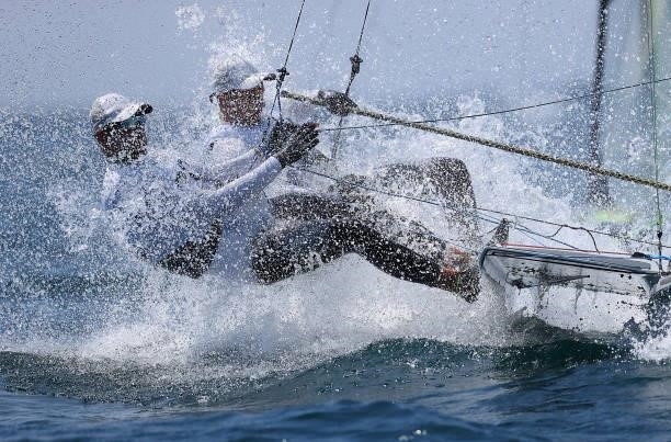 Lukasz Przybytek and Pawel Kolodzinski of Team Poland compete in the Men's Skiff - 49er class on day five of the Tokyo 2020 Olympic Games at Enoshima...
