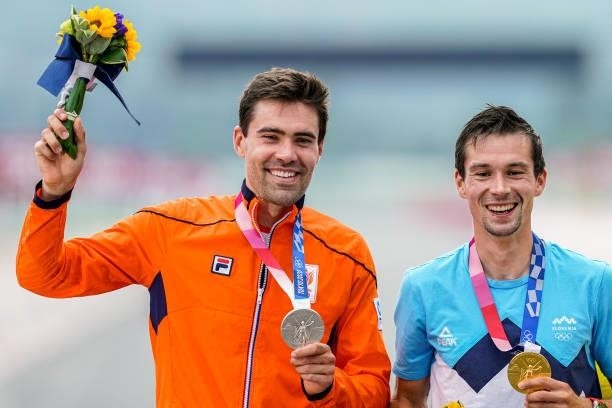 Tom Dumoulin of the Netherlands with his silver medal, Primoz Roglic of Slovenia with his gold medal competing on Men's Individual Time Trial during...