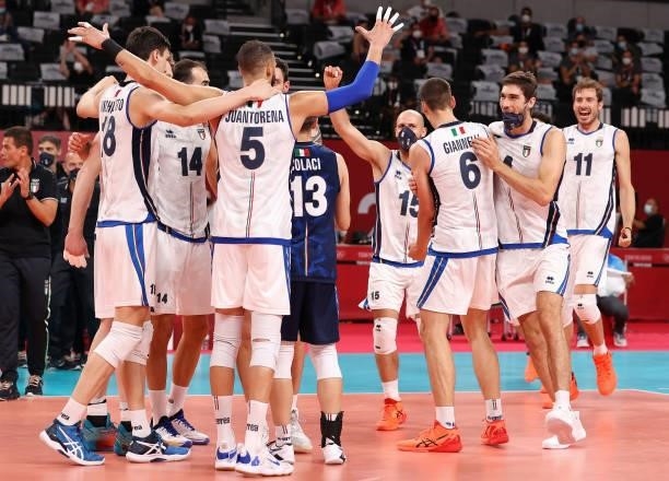 Players of Team Italy reacts after defeating Japan during the Men's Preliminary Round - Pool A volleyball on day five of the Tokyo 2020 Olympic Games...