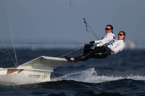 Alex Maloney and Molly Meech of Team New Zealand compete in the Women's Skiff - 49er class on day five of the Tokyo 2020 Olympic Games at Enoshima...