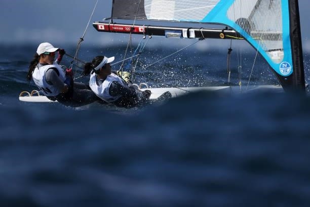 Anna Yamazaki and Sena Takano of Team Japan of Team Argentina compete in the Women's Skiff - 49er class on day five of the Tokyo 2020 Olympic Games...