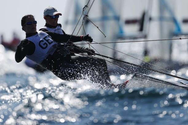 Tina Lutz and Susann Beucke of Team Germany compete in the Women's Skiff - 49er class on day five of the Tokyo 2020 Olympic Games at Enoshima Yacht...