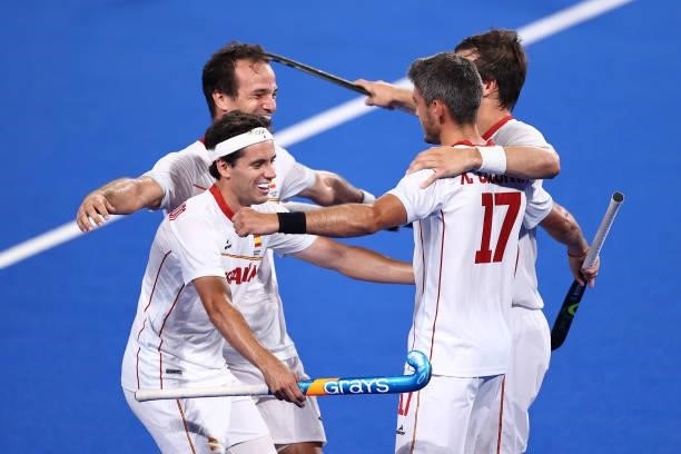 Xavier Lleonart Blanco of Team Spain celebrates with teammates after scoring their team's fourth goal from a penalty stroke during the Men's...