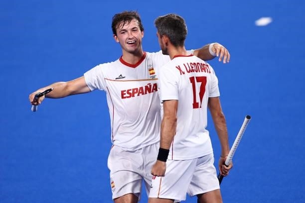 Xavier Lleonart Blanco of Team Spain celebrates with teammate Maria Basterra Jose after scoring their team's fourth goal from a penalty stroke during...