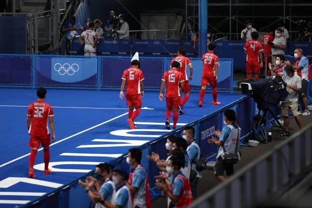 Team Japan are applauded upon leaving the pitch following a loss in the Men's Preliminary Pool A match between Japan and Spain on day five of the...