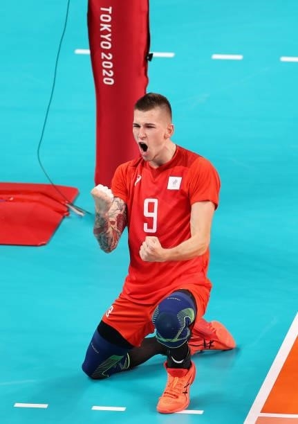 Ivan Iakovlev of Team ROC reacts against Team Brazil during the Men's Preliminary Round - Pool B volleyball on day five of the Tokyo 2020 Olympic...
