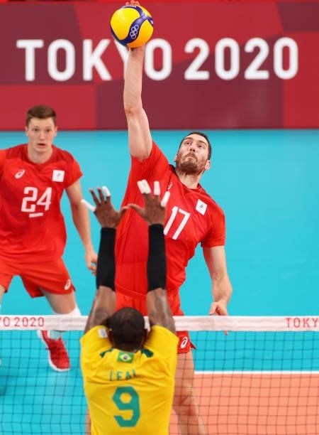 Maxim Mikhaylov of Team ROC competes against Yoandy Leal Hidalgo of Team Brazil during the Men's Preliminary Round - Pool B volleyball on day five of...