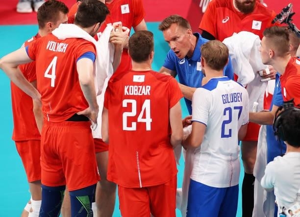 Head Coach Tuomas Sammelvuo of Team ROC talks with players against Team Brazil during the Men's Preliminary Round - Pool B volleyball on day five of...