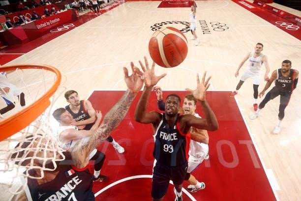 Moustapha Fall and Vincent Poirier of Team France go up for a rebound against Jan Vesely of Team Czech Republic during the second half of a Men's...