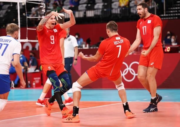 Ivan Iakovlev of Team ROC reacts with team mate Dmitry Volkov against Team Brazil during the Men's Preliminary Round - Pool B volleyball on day five...
