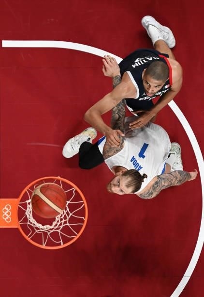 Patrik Auda of Team Czech Republic and Nicolas Batum of Team France eye the ball during the first half of a Men's Preliminary Round Group A game on...