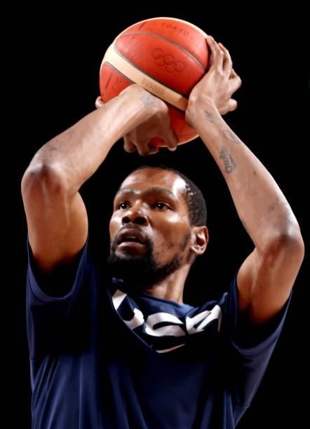 Kevin Durant of Team United States warms up before a Men's Preliminary Round Group A game against Islamic Republic of Iran on day five of the Tokyo...