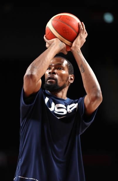 Kevin Durant of Team United States warms up before a Men's Preliminary Round Group A game against Islamic Republic of Iran on day five of the Tokyo...