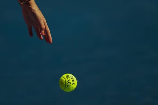 Details of a Tokyo 2020 tennis ball is seen as Anastasia Pavlyuchenkova of Team ROC serves during her Women's Singles Quarterfinal match against...