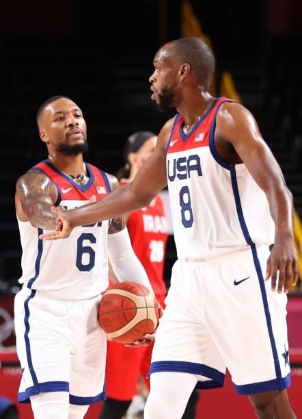 Damian Lillard Team Andorra Khris Middleton of Team United States celebrate while playing during the Men's Preliminary Round Group A game on day five...