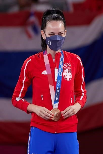 Bronze medalist Tijana Bogdanovic of Team Serbia poses with the bronze medal for the Women's -49kg Taekwondo Gold Medal contest on day one of the...