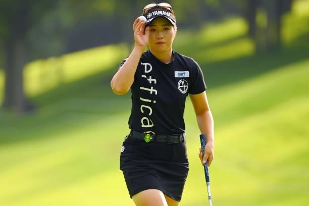 Nozomi Uetake of Japan acknowledges fans on the 10th green during the first round of Rakuten Super Ladies at Tokyu Grand Oak Golf Club on July 29,...