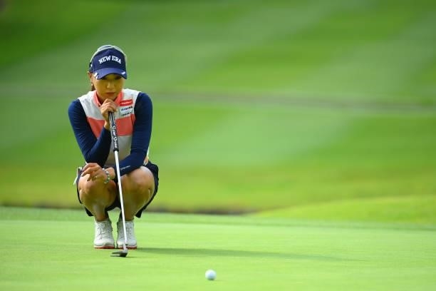 Naruha Miyata of Japan lines up a putt on the 13th green during the first round of Rakuten Super Ladies at Tokyu Grand Oak Golf Club on July 29, 2021...