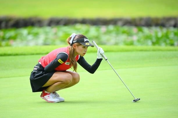 Reika Usui of Japan lines up a putt on the 13th green during the first round of Rakuten Super Ladies at Tokyu Grand Oak Golf Club on July 29, 2021 in...