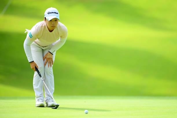 Saki Nagamine of Japan lines up a putt on the 15th green during the first round of Rakuten Super Ladies at Tokyu Grand Oak Golf Club on July 29, 2021...