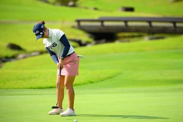 Mamiko Higa of Japan attempts a putt on the 13th green during the first round of Rakuten Super Ladies at Tokyu Grand Oak Golf Club on July 29, 2021...