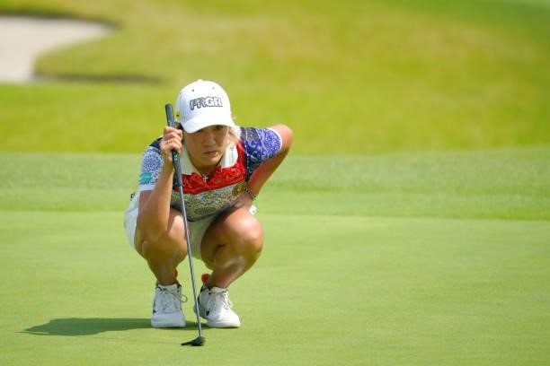 Asako Fujimoto of Japan lines up a putt on the 5th green during the first round of Rakuten Super Ladies at Tokyu Grand Oak Golf Club on July 29, 2021...