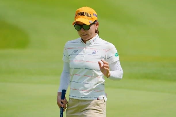 Chie Arimura of Japan acknowledges fans after the birdie on the 5th green during the first round of Rakuten Super Ladies at Tokyu Grand Oak Golf Club...
