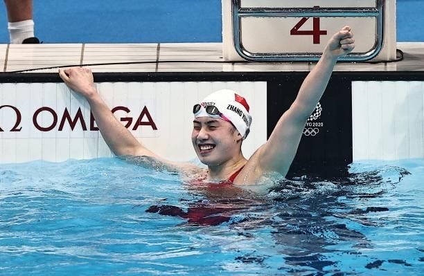 Zhang Yufei of Team China celebrates after winning the Women's 200m Butterfly Final on day six of the Tokyo 2020 Olympic Games at Tokyo Aquatics...