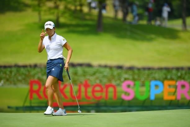 Hinako Shibuno of Japan acknowledges fans on the 18th green during the first round of Rakuten Super Ladies at Tokyu Grand Oak Golf Club on July 29,...