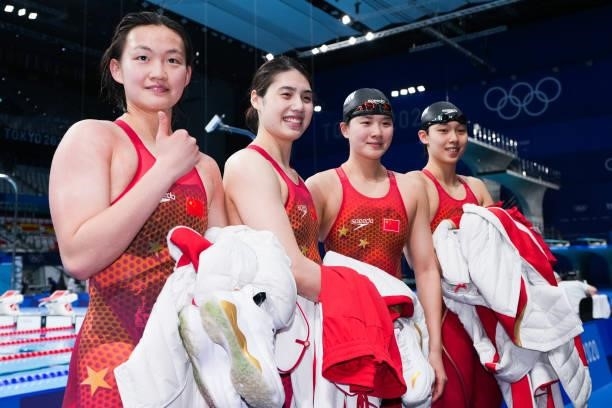 Gold medalists Yang Junxuan, Tang Muhan, Zhang Yufei and Li Bingjie of China celebrate during the medal ceremony for the Women's 4 x 200 m Freestyle...