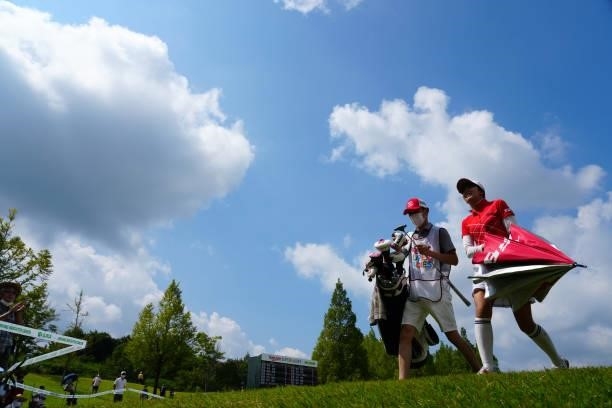 Kotone Hori of Japan leaves the 18th green during the first round of Rakuten Super Ladies at Tokyu Grand Oak Golf Club on July 29, 2021 in Kato,...