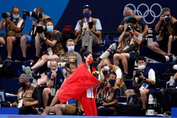 Gold medalist Zhang Yufei of Team China celebrates after the Women's 200m Butterfly Final medal ceremony on day six of the Tokyo 2020 Olympic Games...