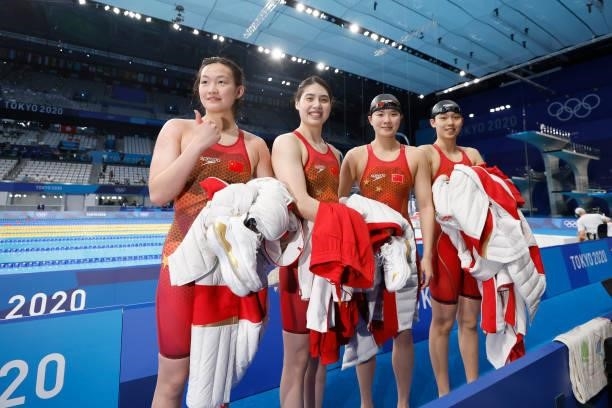 Yang Junxuan, Tang Muhan, Zhang Yufei and Li Bingjie of Team China celebrate after winning the Women's 4 x 200 m Freestyle Relay Final on day six of...