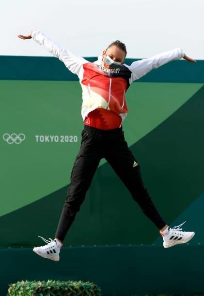 Bronze medalist Andrea Herzog of Team Germany celebrates during the medal ceremony following the Women's Canoe Slalom Final on day six of the Tokyo...