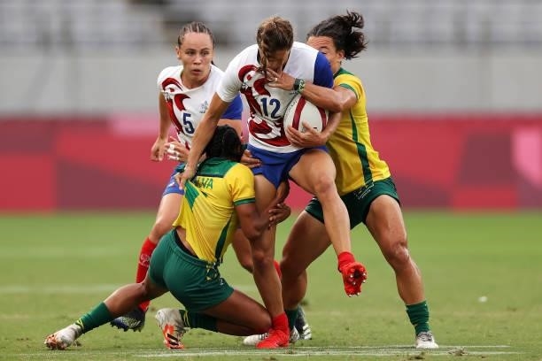 Lina Guerin of Team France is tackled in the Women’s pool B match between Team France and Team Brazil during the Rugby Sevens on day six of the Tokyo...