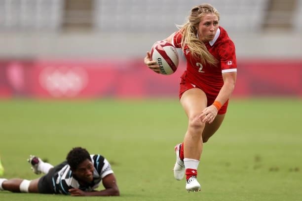 Kayla Moleschi of team Canada makes a break in the Women’s pool B match between Team France and Team Brazil during the Rugby Sevens on day six of the...