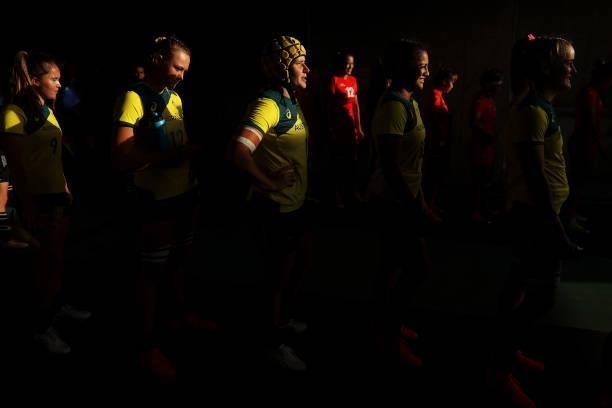 The Team Australia players prepare to take the field in the Women’s pool C match between Team Australia and Team China during the Rugby Sevens on day...